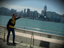 Standin in Ave. of Stars in Tsim Sha Tsui, I was pointing to Hong Kong Convention and Exhibition Centre, where the fairs take place.